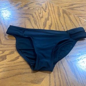 Small black swimsuit bottoms.